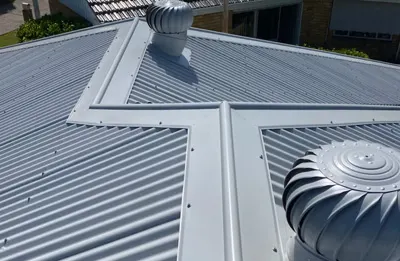 New metal roof with ridge venting — Central Coast